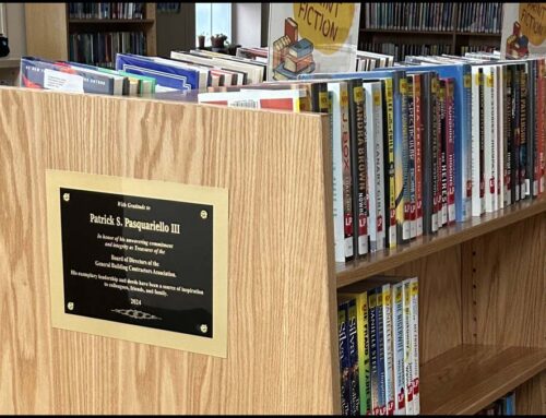 GBCA Honors Pat Pasquariello with a Bookshelf in the Longport Public Library